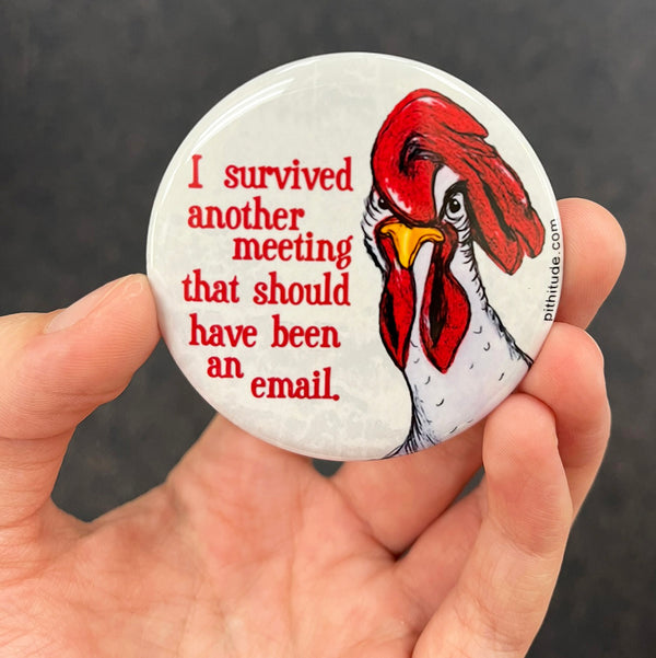 Funny office chicken magnet held in hand to show 2.25-inch size and glossy finish