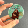 Funny coffee lover magnet held in hand to show 2.25-inch size and glossy finish