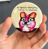 Funny cheese lover magnet held in hand to show 2.25-inch size and glossy finish