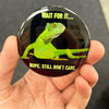 Funny iguana magnet held in hand to show 2.25-inch size and glossy finish