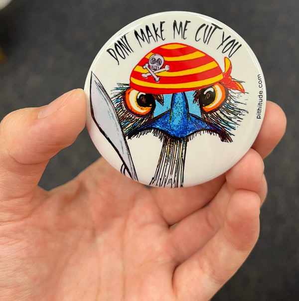 Funny pirate emu magnet held in hand to show 2.25-inch size and glossy finish