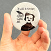 Funny Edgar Allan Poe magnet held in hand to show 2.25-inch size and glossy finish