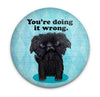 Funny dog magnet with You're Doing It Wrong quote